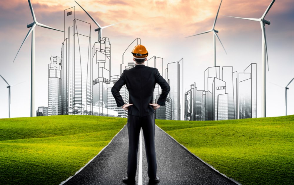 an image showing an environmental engineer with a back ground of illustrated buildings and windmills - Telikoz 